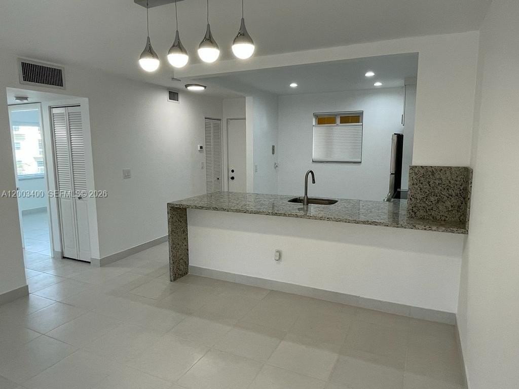 7732 Camino Real #F318 - Photo 3 of 18