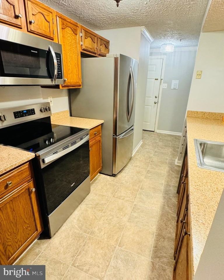 13113 Briarcliff Ter #1-102 - Photo 4 of 12