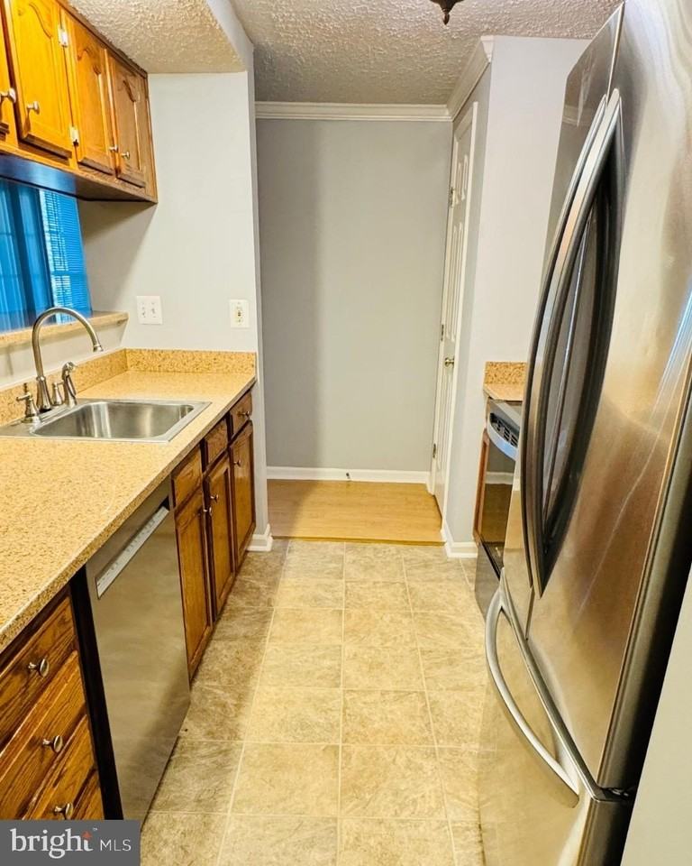 13113 Briarcliff Ter #1-102 - Photo 5 of 12