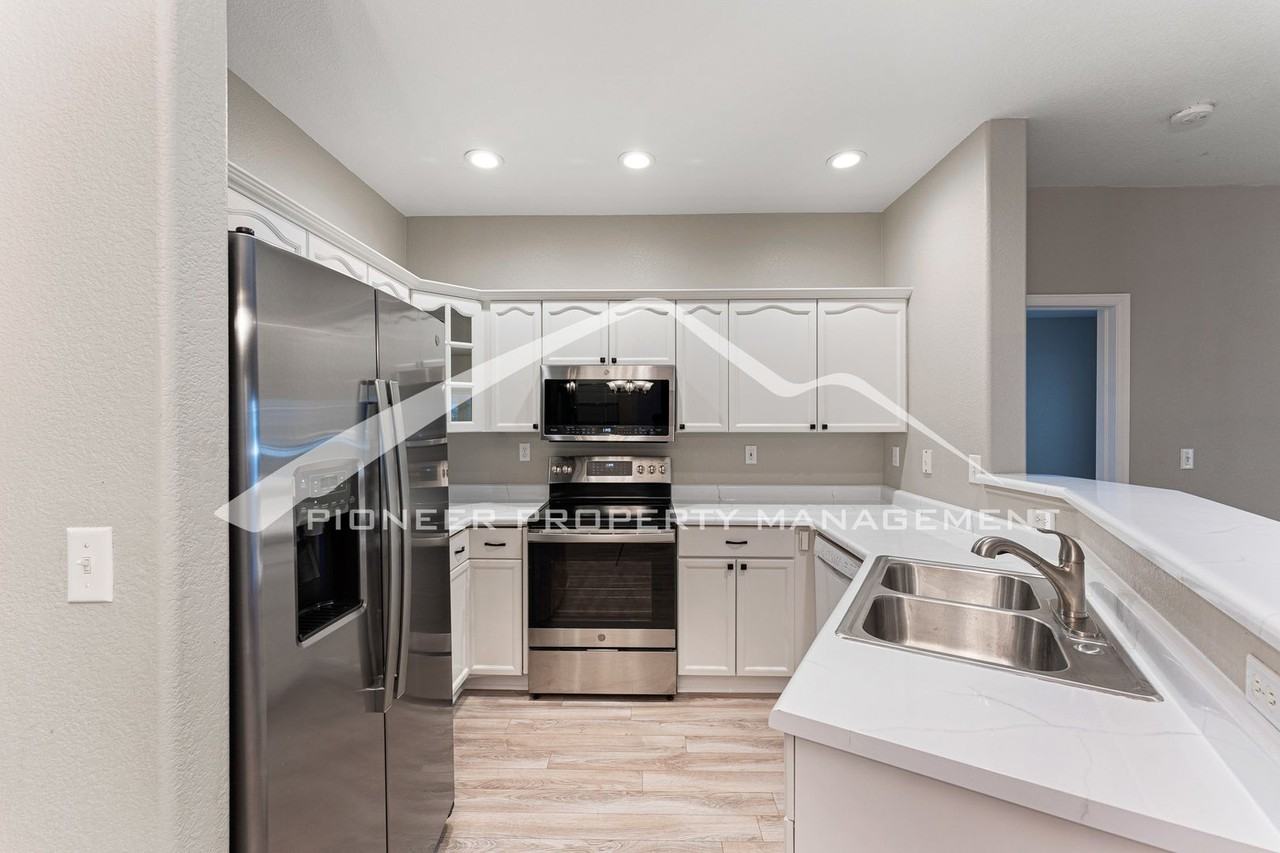 7459 S Alkire St #102 - Photo 4 of 13