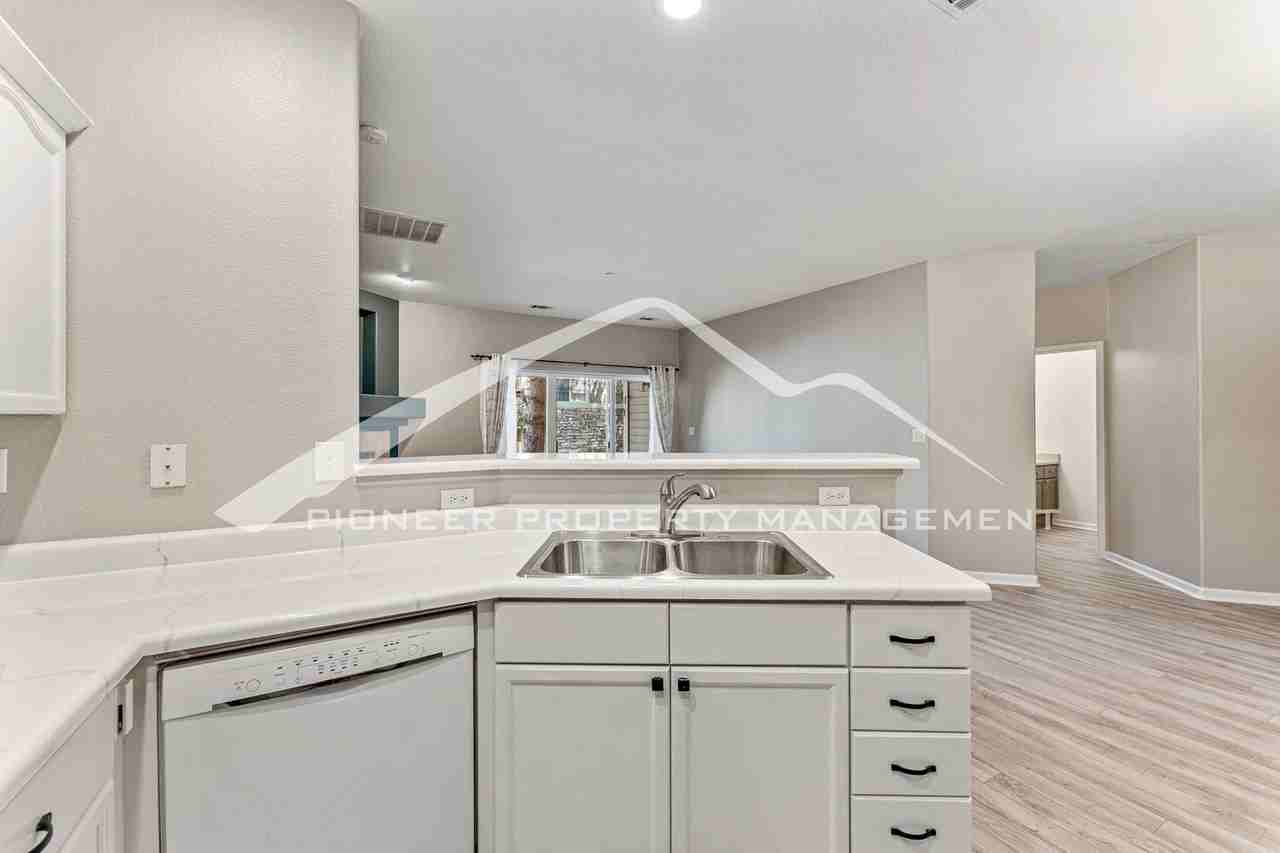 7459 S Alkire St #102 - Photo 5 of 13