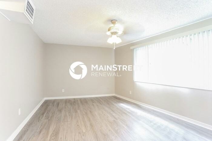 5561 90th Ave N - Photo 3 of 16