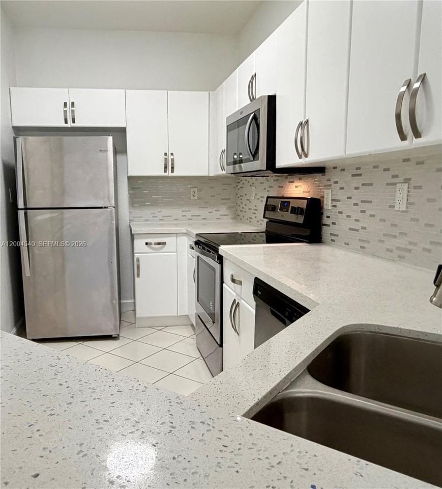 7130 Nw 177th St #105-8 - Photo 3 of 10