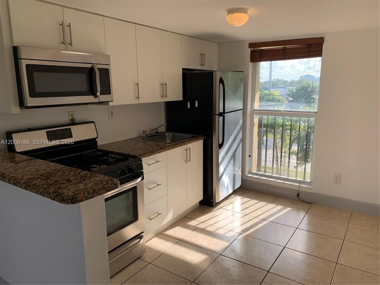 241 S Royal Poinciana Blvd #310 - Photo 2 of 10