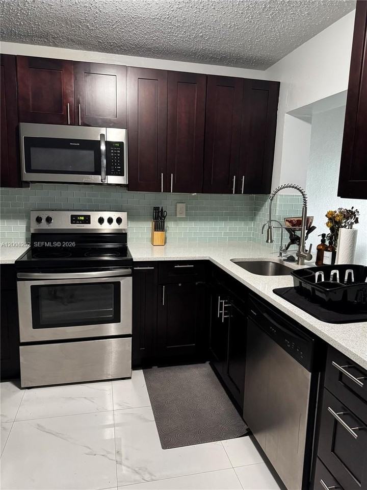 1740 Ne 56th St - Photo 4 of 25