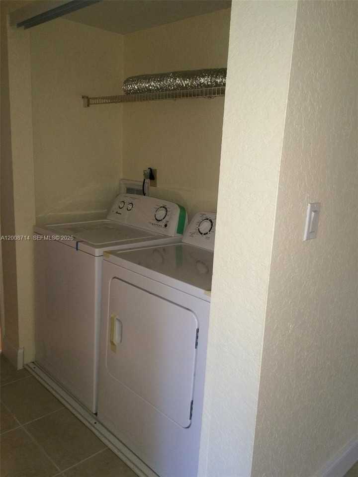 407 Gardens Dr #103 - Photo 5 of 9