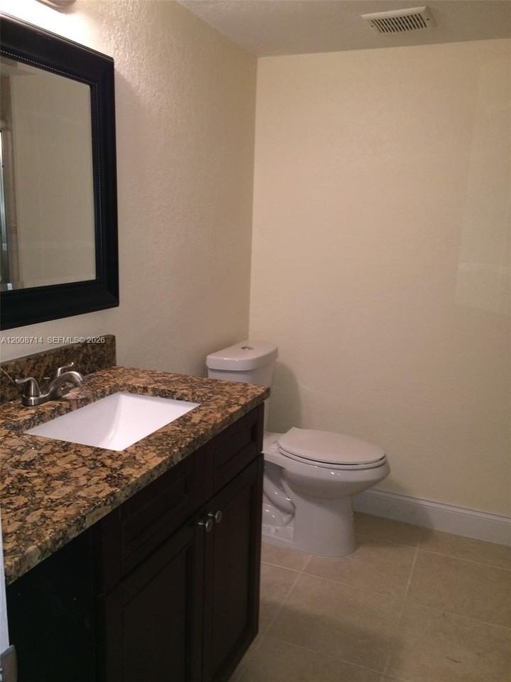 407 Gardens Dr #103 - Photo 6 of 9