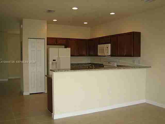9011 Sw 227th St #2 - Photo 3 of 24