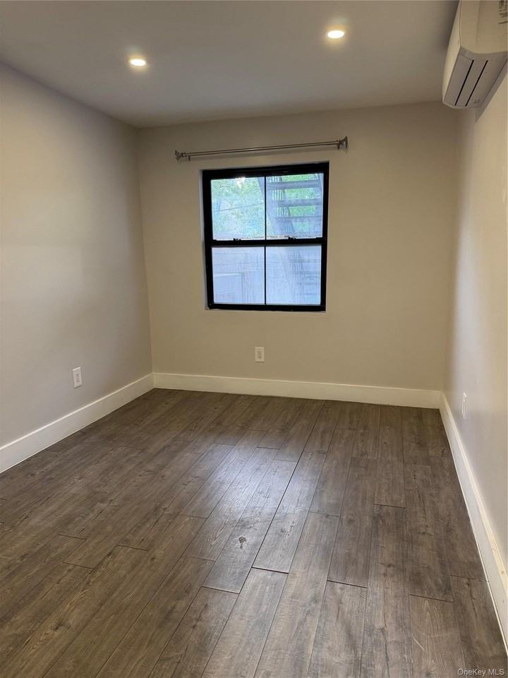 11342 Springfield Blvd #1stFL - Photo 4 of 5