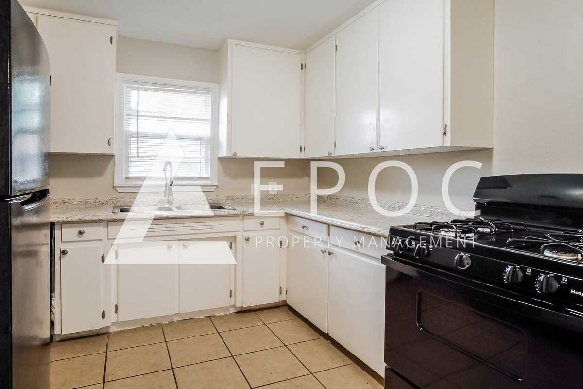 237 S 73rd East Ave - Photo 4 of 16