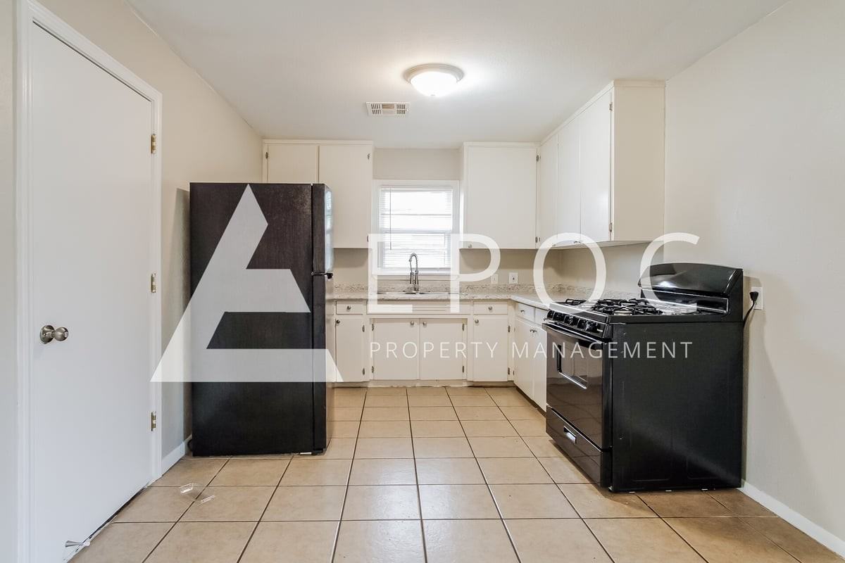 237 S 73rd East Ave - Photo 5 of 16