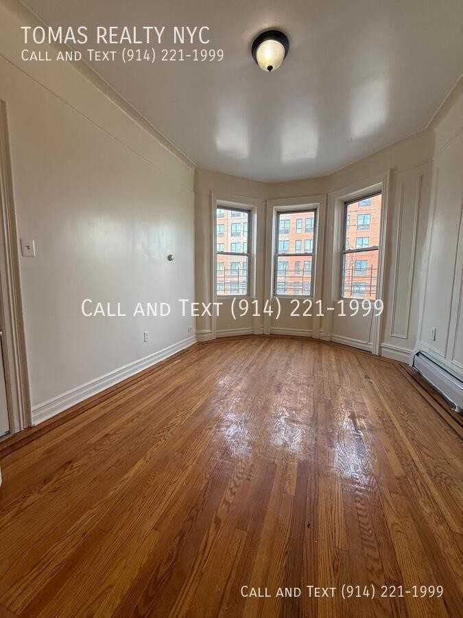 776 E 233rd St - Photo 2 of 14