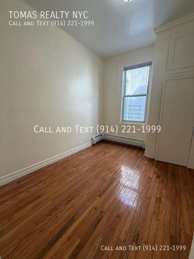 776 E 233rd St - Photo 3 of 14