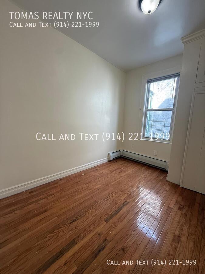 776 E 233rd St - Photo 6 of 14