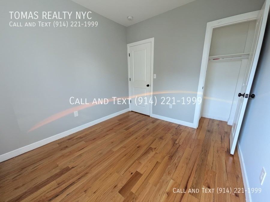 776 E 233rd St - Photo 2 of 5