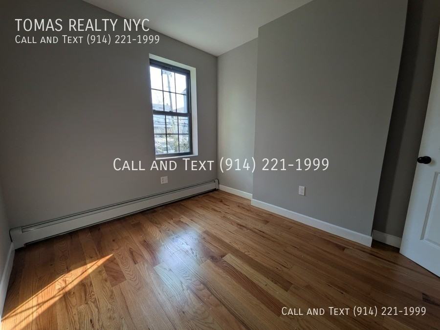 776 E 233rd St - Photo 3 of 5