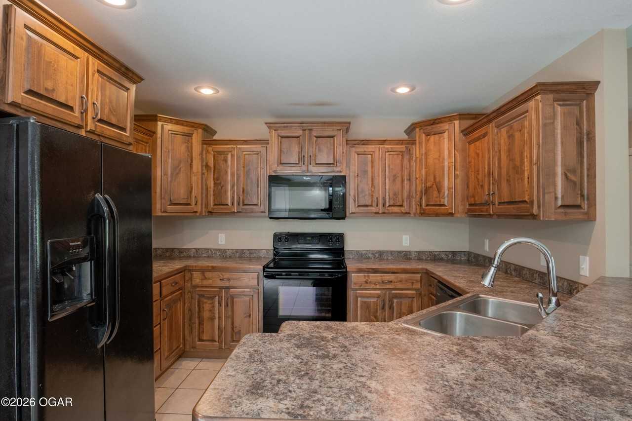 1613 S Oronogo St - Photo 5 of 12