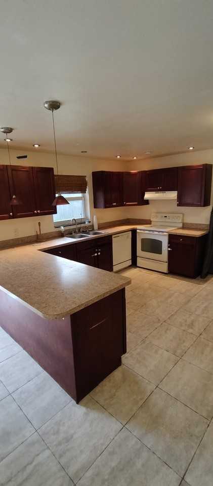 12126 Gibbs Rd #12126 - Photo 3 of 18