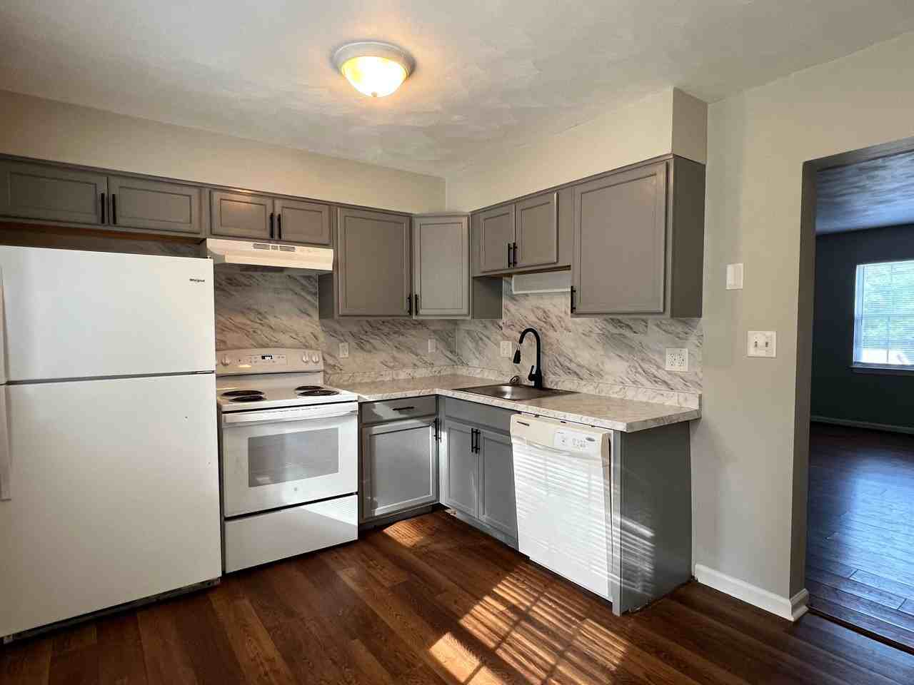 Troxell Townhomes - Photo 7 of 9