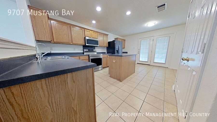 9707 Mustang Bay - Photo 6 of 15