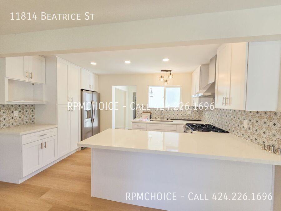 11814 Beatrice St - Photo 6 of 35