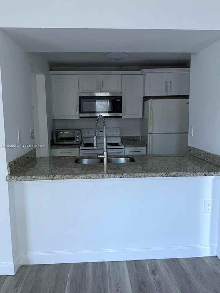 6955 Nw 186th St #F209 - Photo 3 of 14