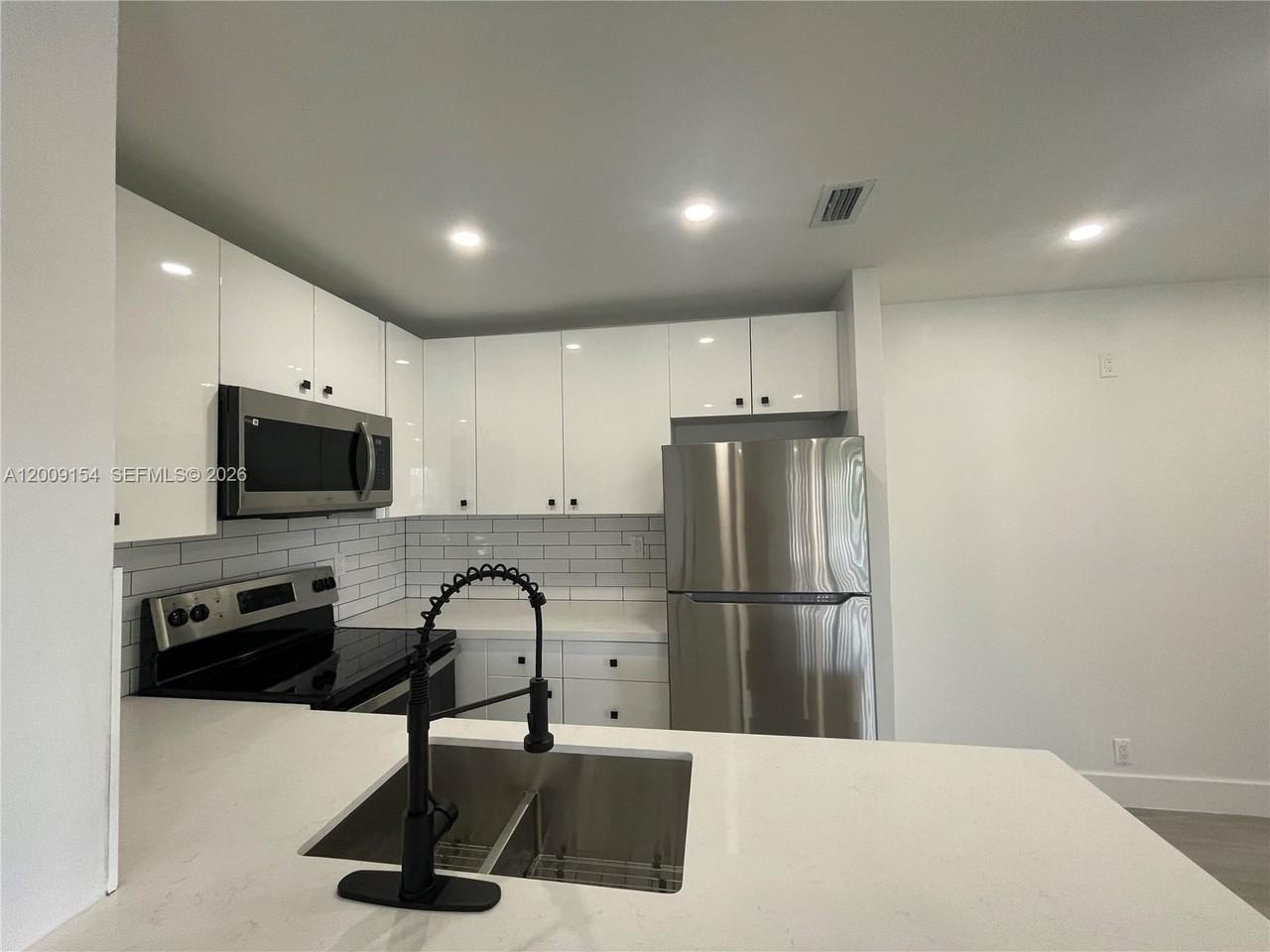 10016 Winding Lake Rd #202 - Photo 7 of 16