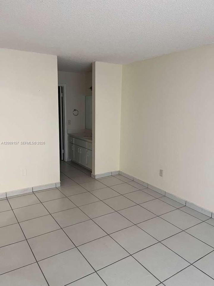 9712 Hammocks Blvd #202-30 - Photo 3 of 8