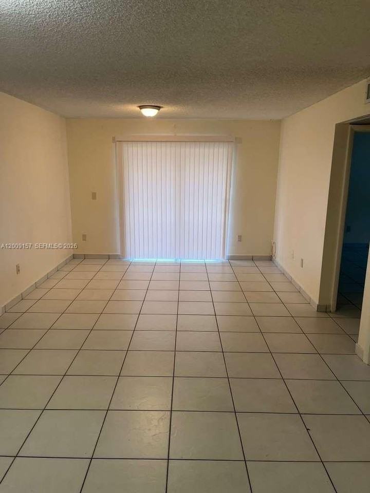 9712 Hammocks Blvd #202-30 - Photo 6 of 8