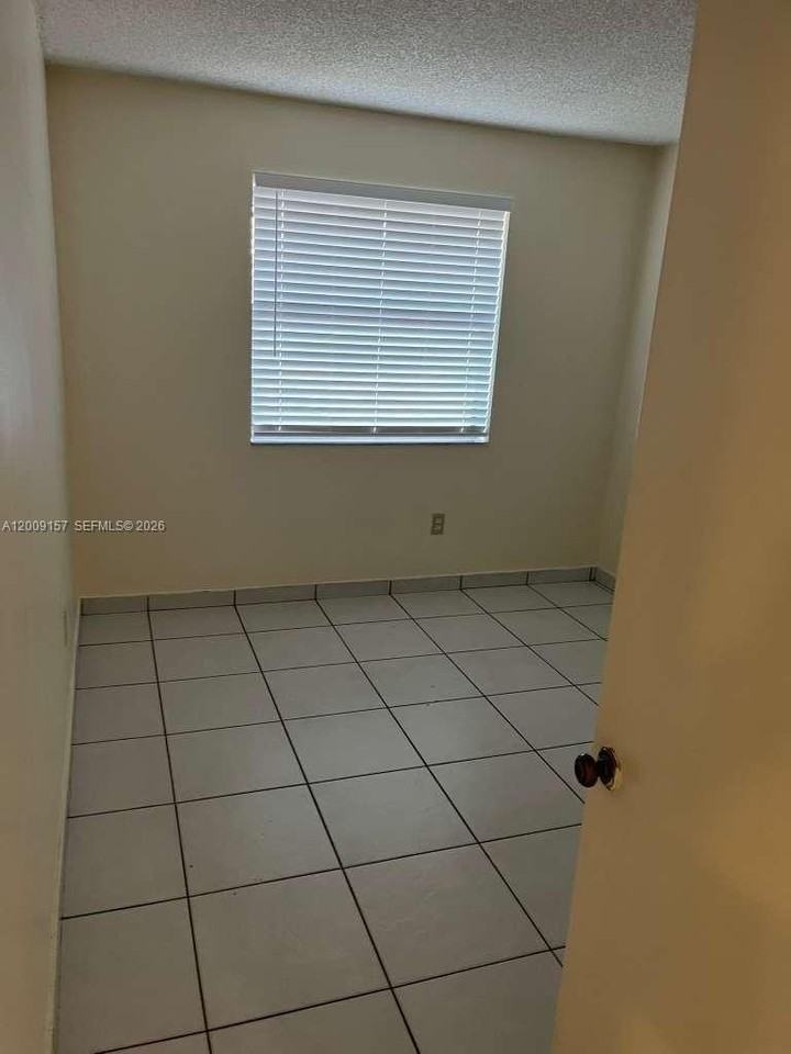 9712 Hammocks Blvd #202-30 - Photo 7 of 8