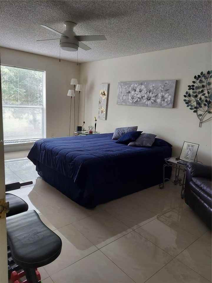 8310 Sands Point Blvd #L305 - Photo 5 of 9