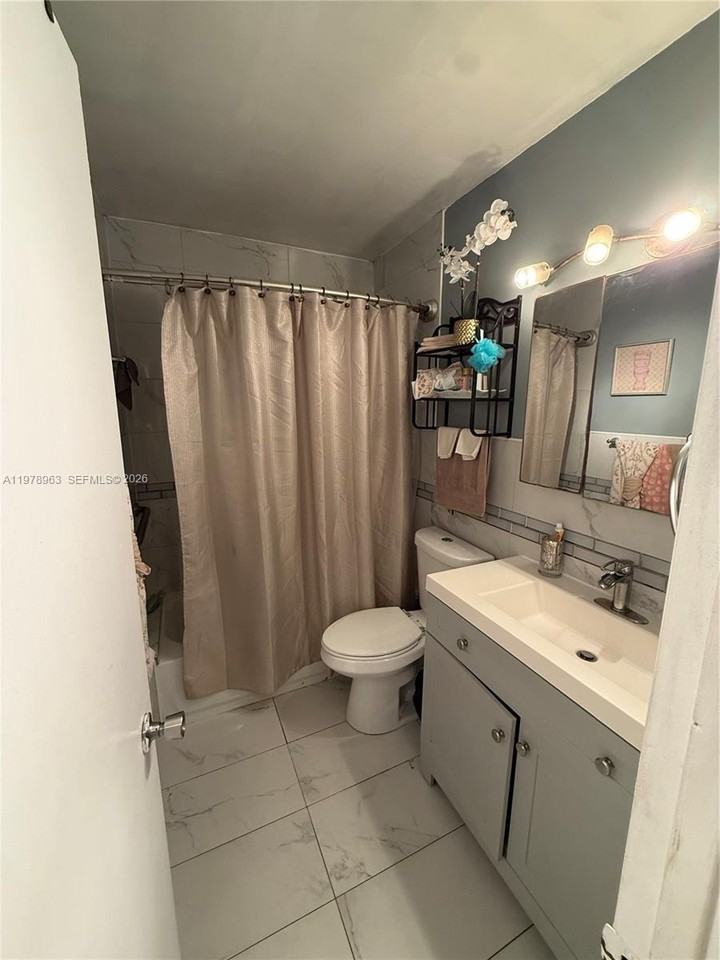 710 N 66th Ter - Photo 5 of 8