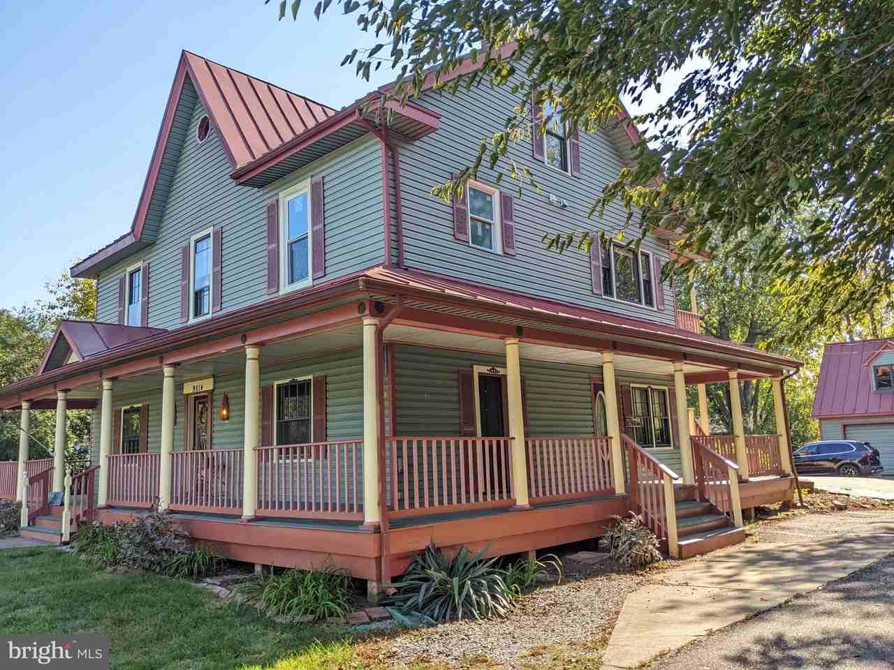 9014 Sudley Rd - Photo 6 of 34