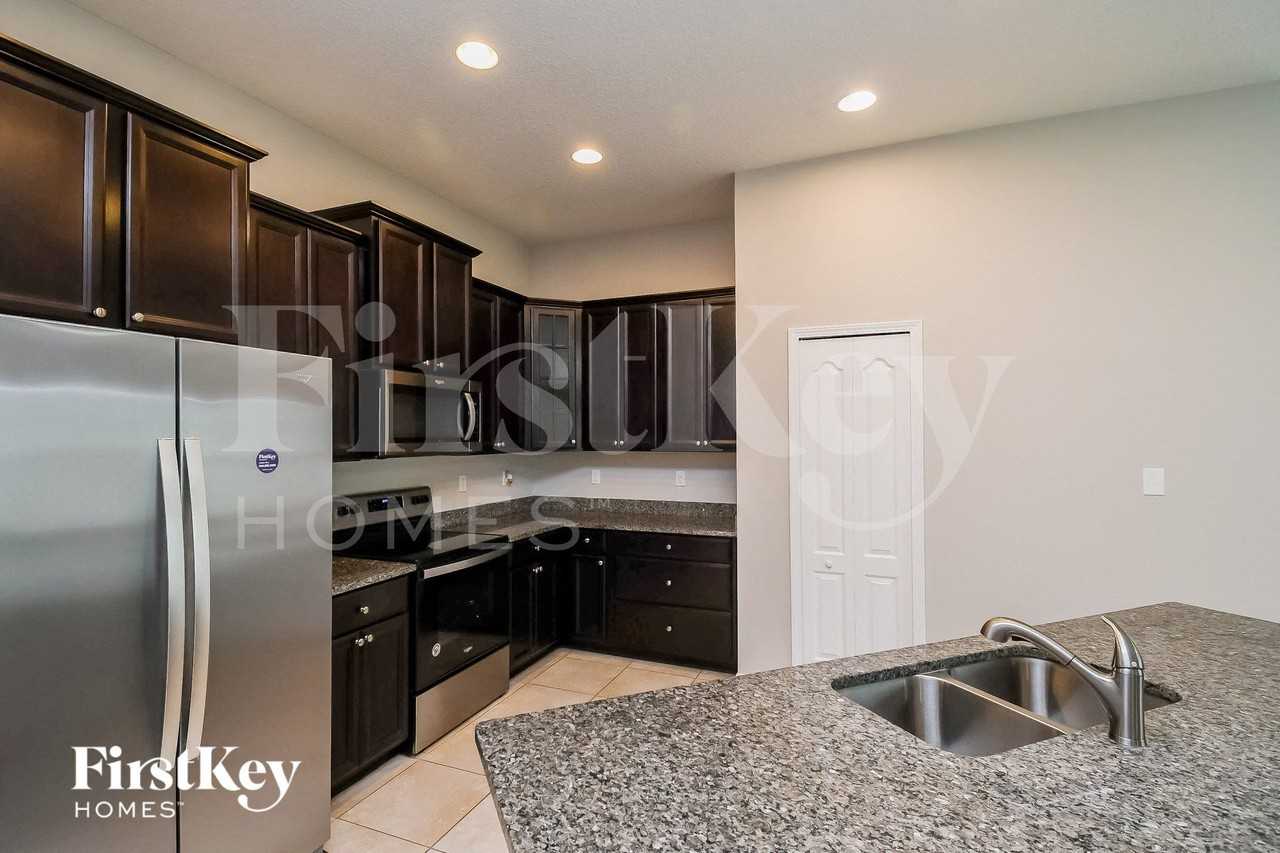 1044 Mayfair Creek Ct - Photo 6 of 15