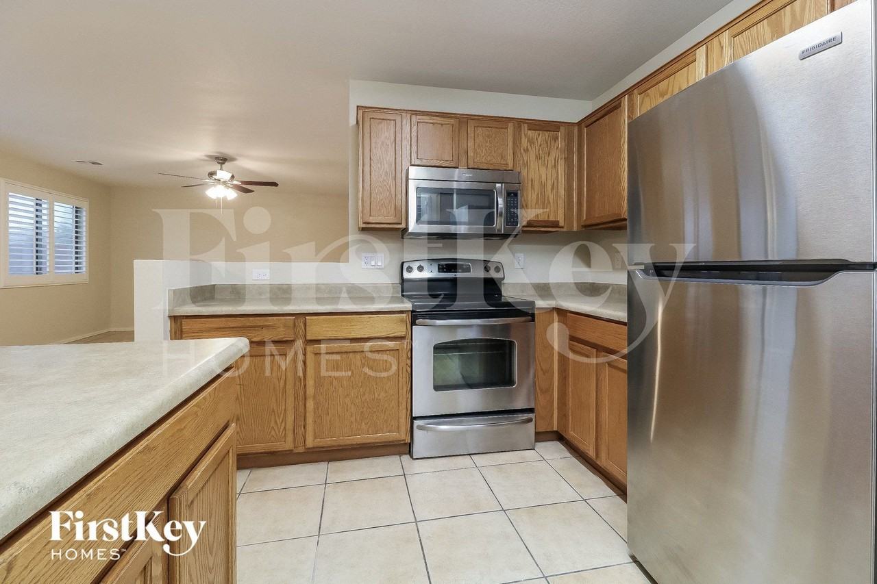 23768 W Desert Bloom St - Photo 7 of 15
