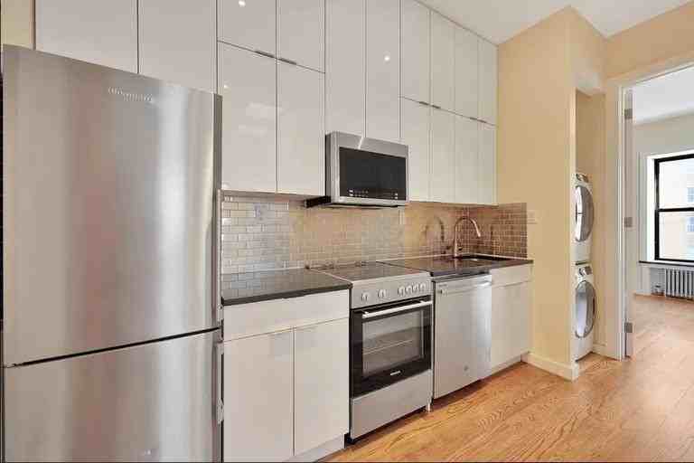 241 E 73rd St - Photo 4 of 5