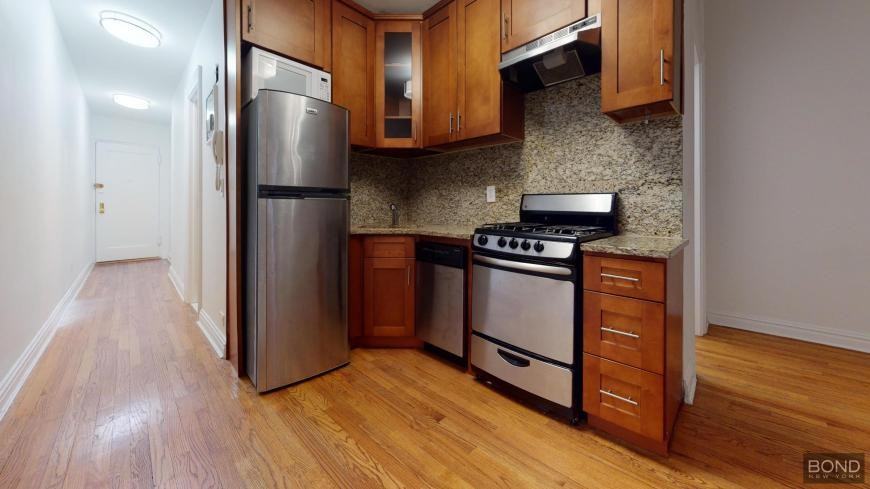 107 W 68th St - Photo 4 of 5