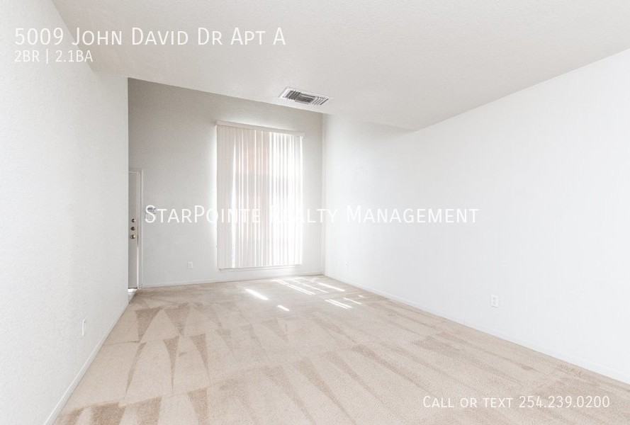 5009 John David Dr Apt A - Photo 5 of 16