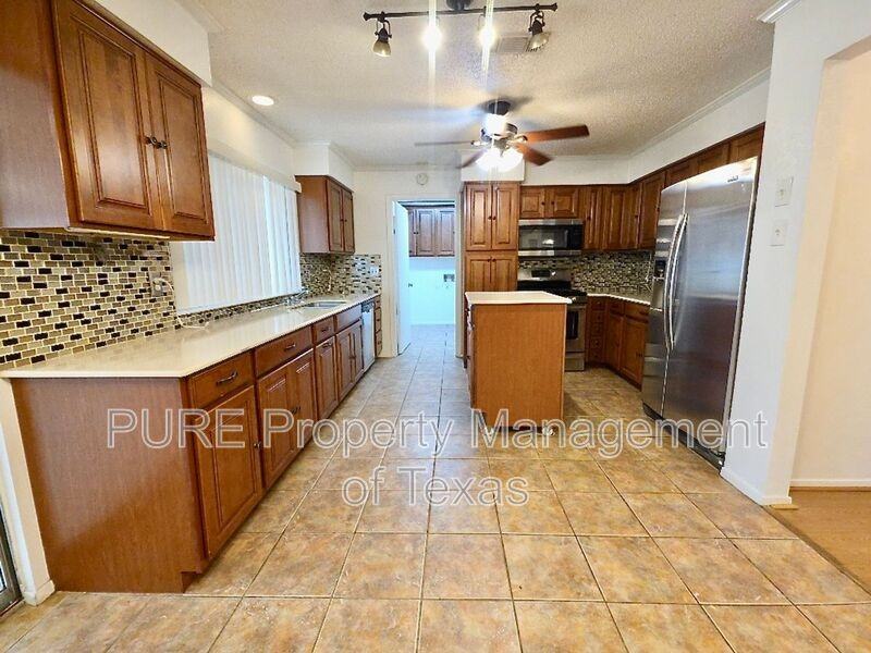 4901 Wing Rd - Photo 5 of 29