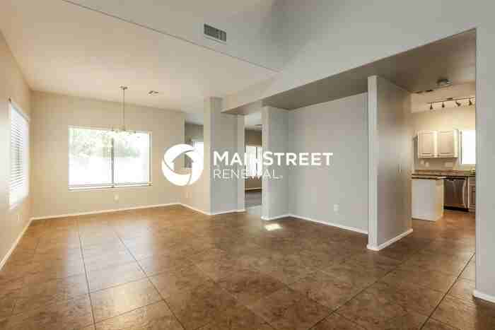 13440 W Gelding Dr - Photo 6 of 17