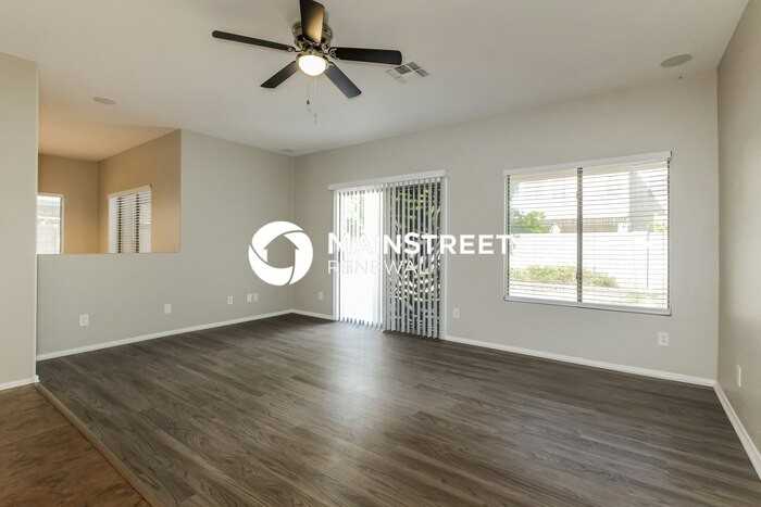 13440 W Gelding Dr - Photo 7 of 17