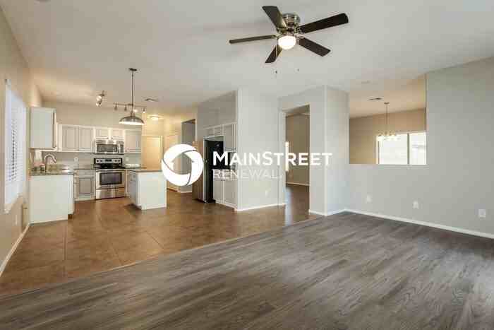 13440 W Gelding Dr - Photo 6 of 17