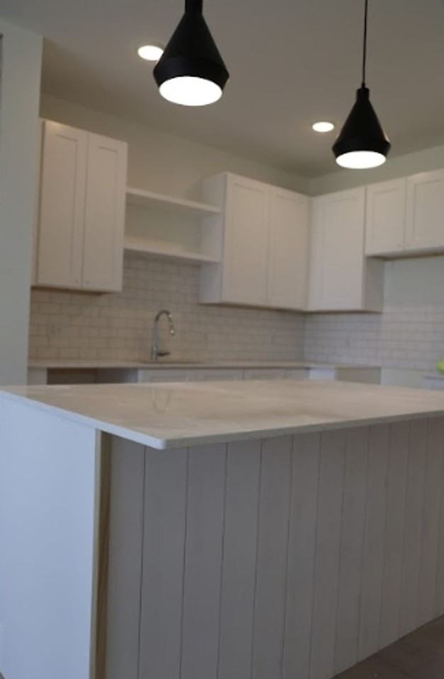 District Flats - Photo 4 of 4