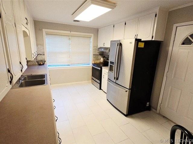 6715 E 27th Pl - Photo 5 of 7