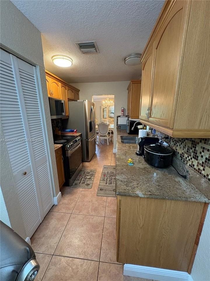 8905 Nw 38th Dr #4 - Photo 3 of 30