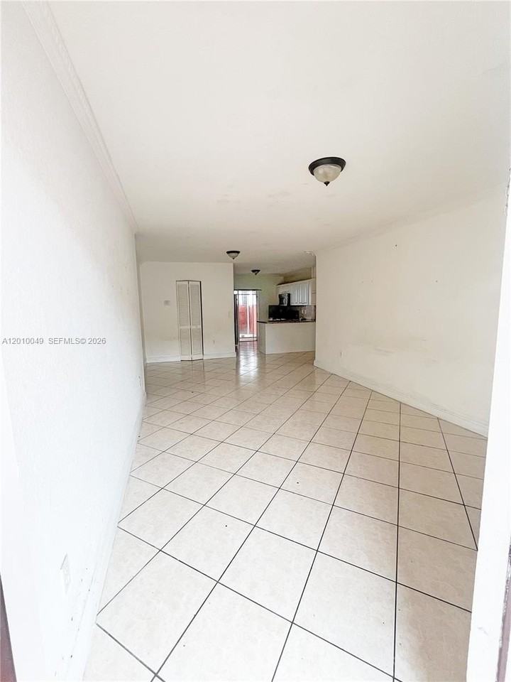 11051 W Okeechobee Rd #101 - Photo 3 of 33