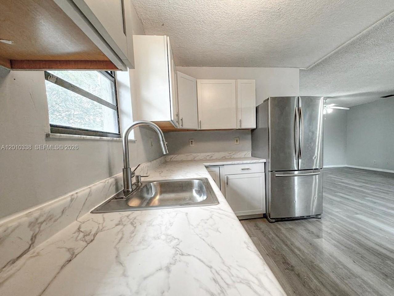 10947 Nw 45th St - Photo 4 of 9