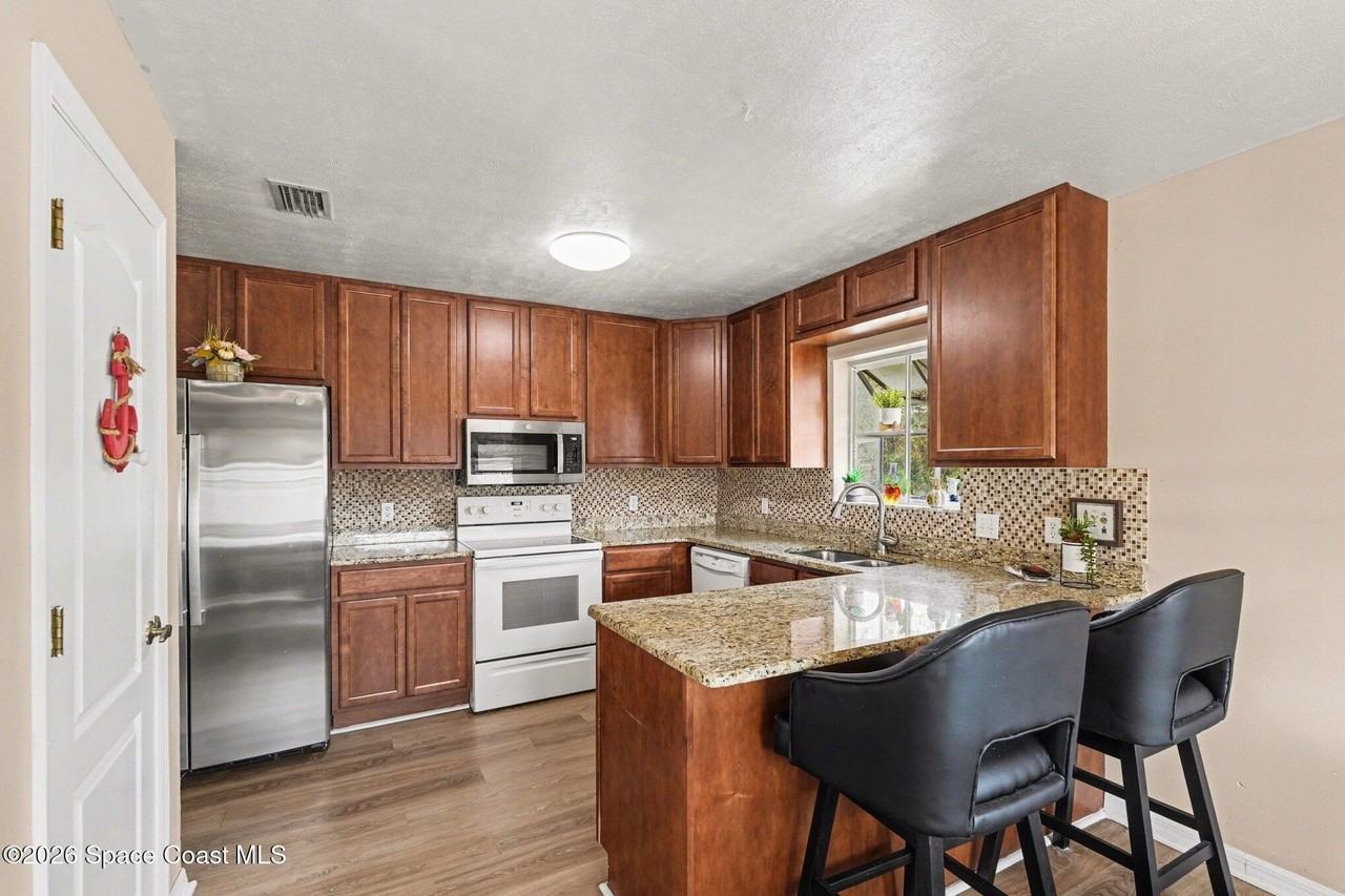 7045 Grissom Pkwy - Photo 7 of 26