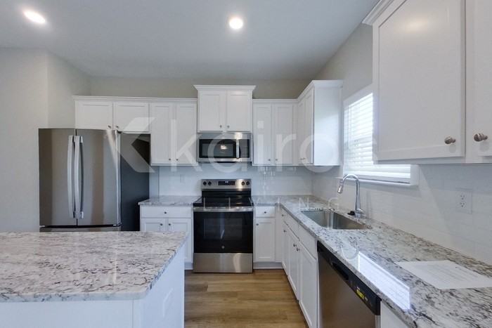 7034 Foggy River Dr - Photo 5 of 25