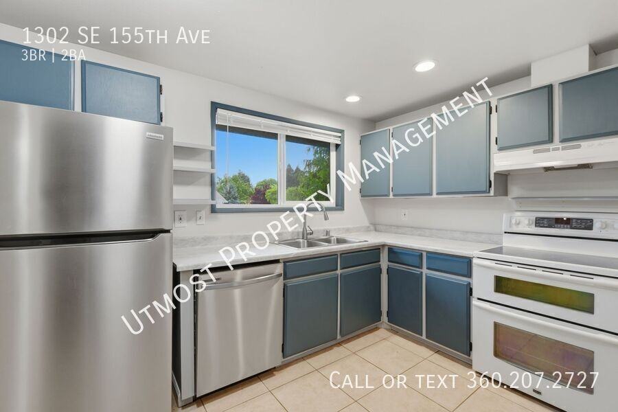1302 Se 155th Ave - Photo 3 of 12